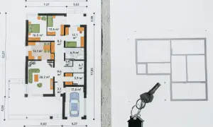 Plan zabudowy domu z garażem i kluczami. Widoczny szkic sytuacyjny z wymiarami pomieszczeń i rozmieszczeniem mebli.