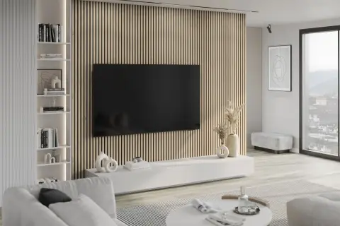 Nowoczesny salon z telewizorem na tle pionowych lamele ścienne inspiracje. Jasne meble, regał z książkami i dekoracje.