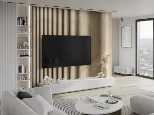 Nowoczesny salon z telewizorem na tle pionowych lamele ścienne inspiracje. Jasne meble, regał z książkami i dekoracje.